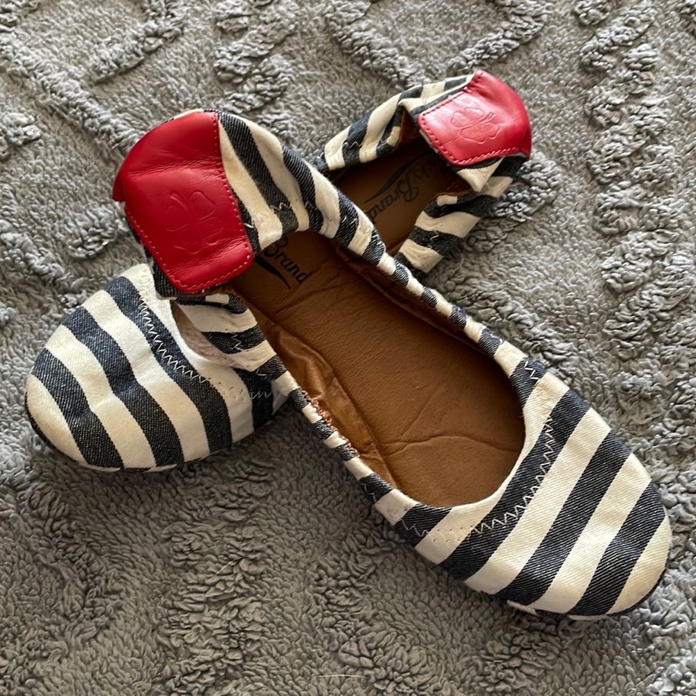 Lucky blue/white striped flats with red accent.